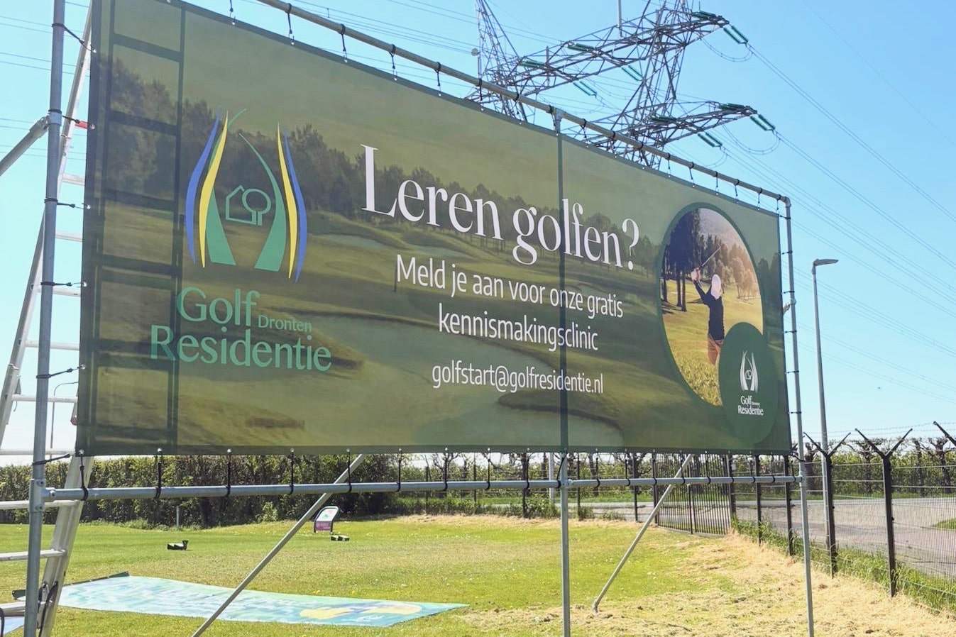 Nieuwe spandoeken om gratis golfclinics te promoten